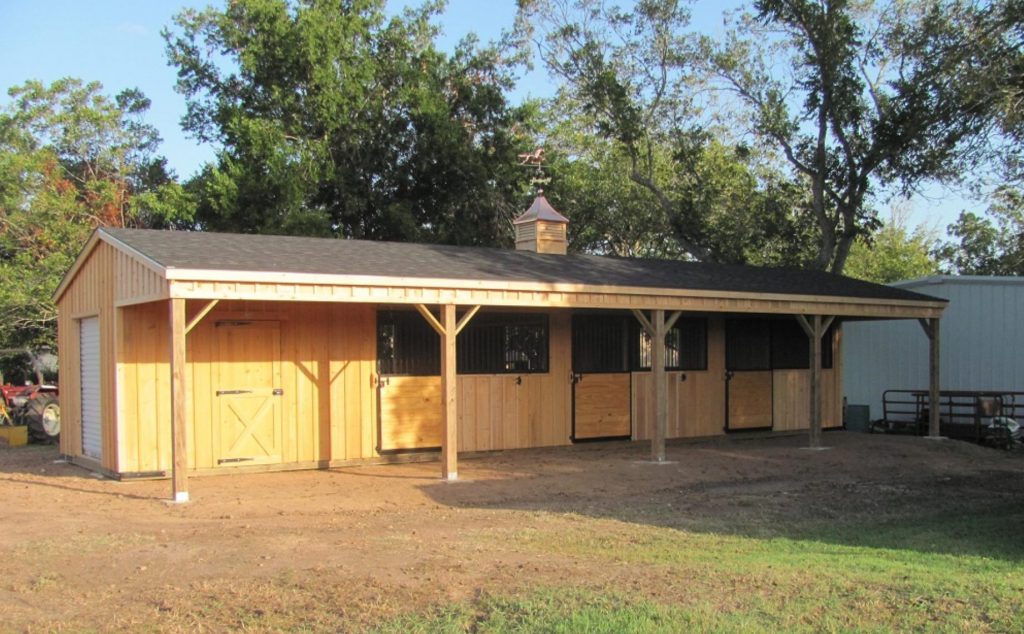 The Benefits of Adding Overhangs to Your Horse Barn - Deer Creek Structures